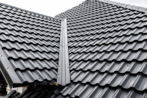 A black, metal, shingled roof in El Paso.